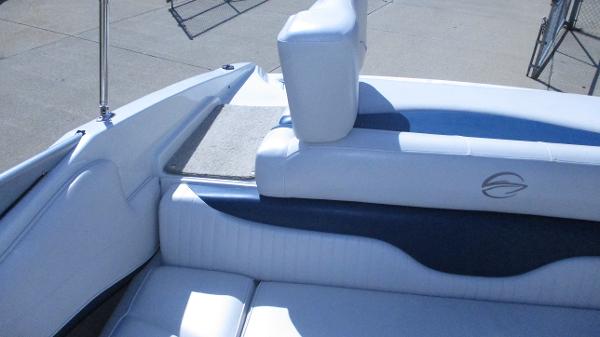 Interior view of a 2012 Crownline 21 SS boat with white seating.