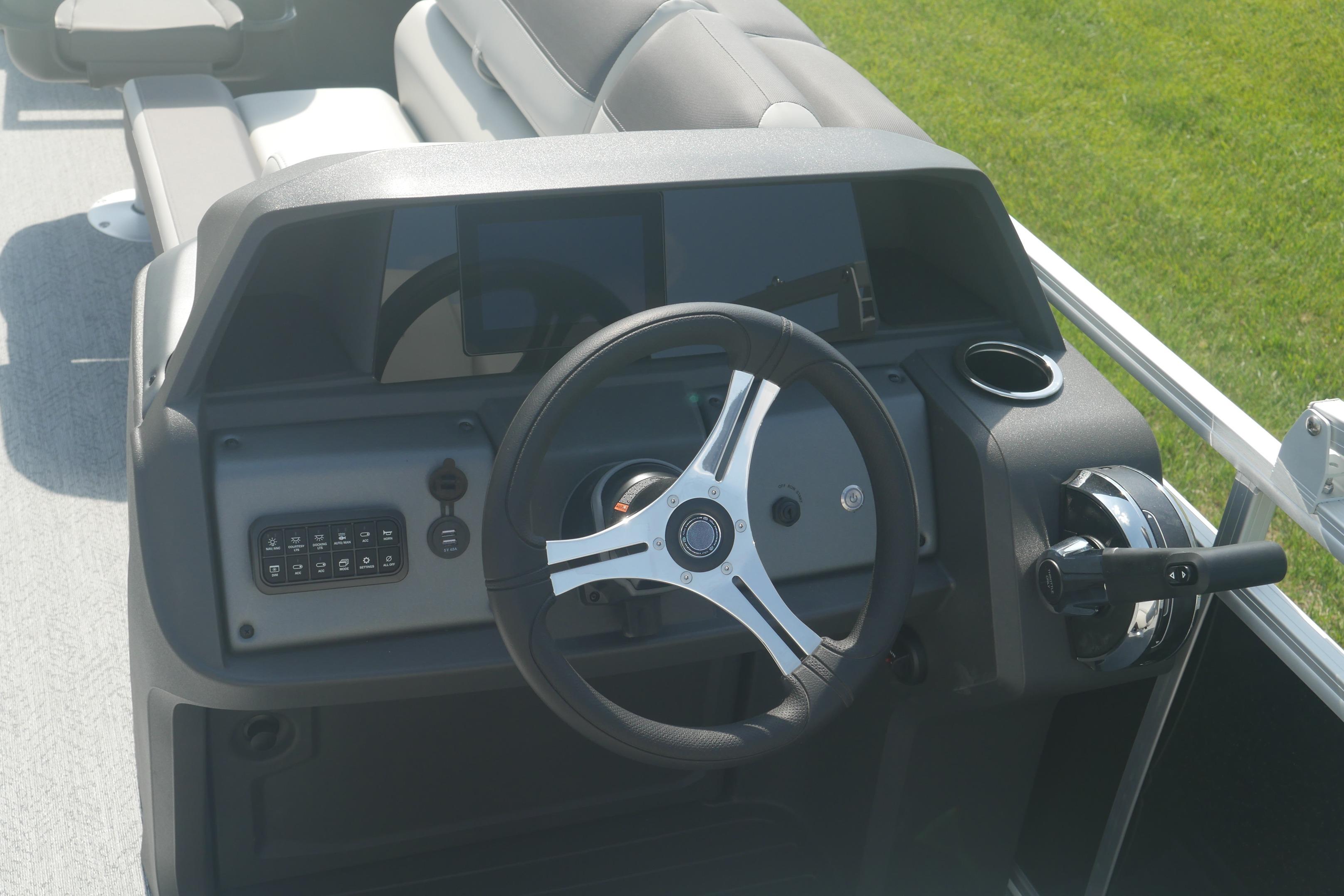 Steering console of 2026 Sun Tracker Fishin' Barge 20 DLX pontoon boat.