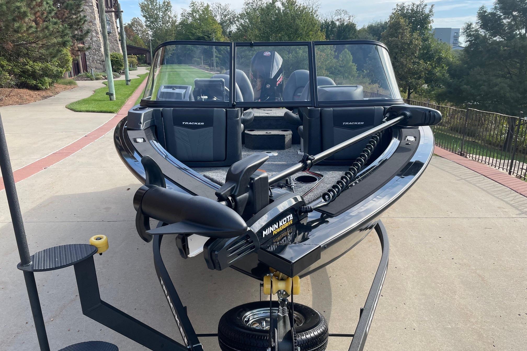 2026 Tracker Targa V-18 WT boat on trailer, parked outdoors.