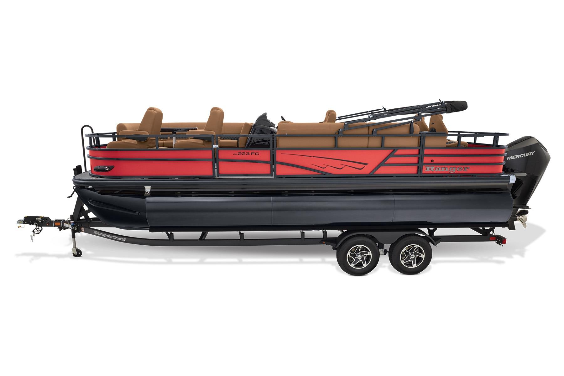 2026 Ranger 223FC pontoon boat with red and black design on trailer.
