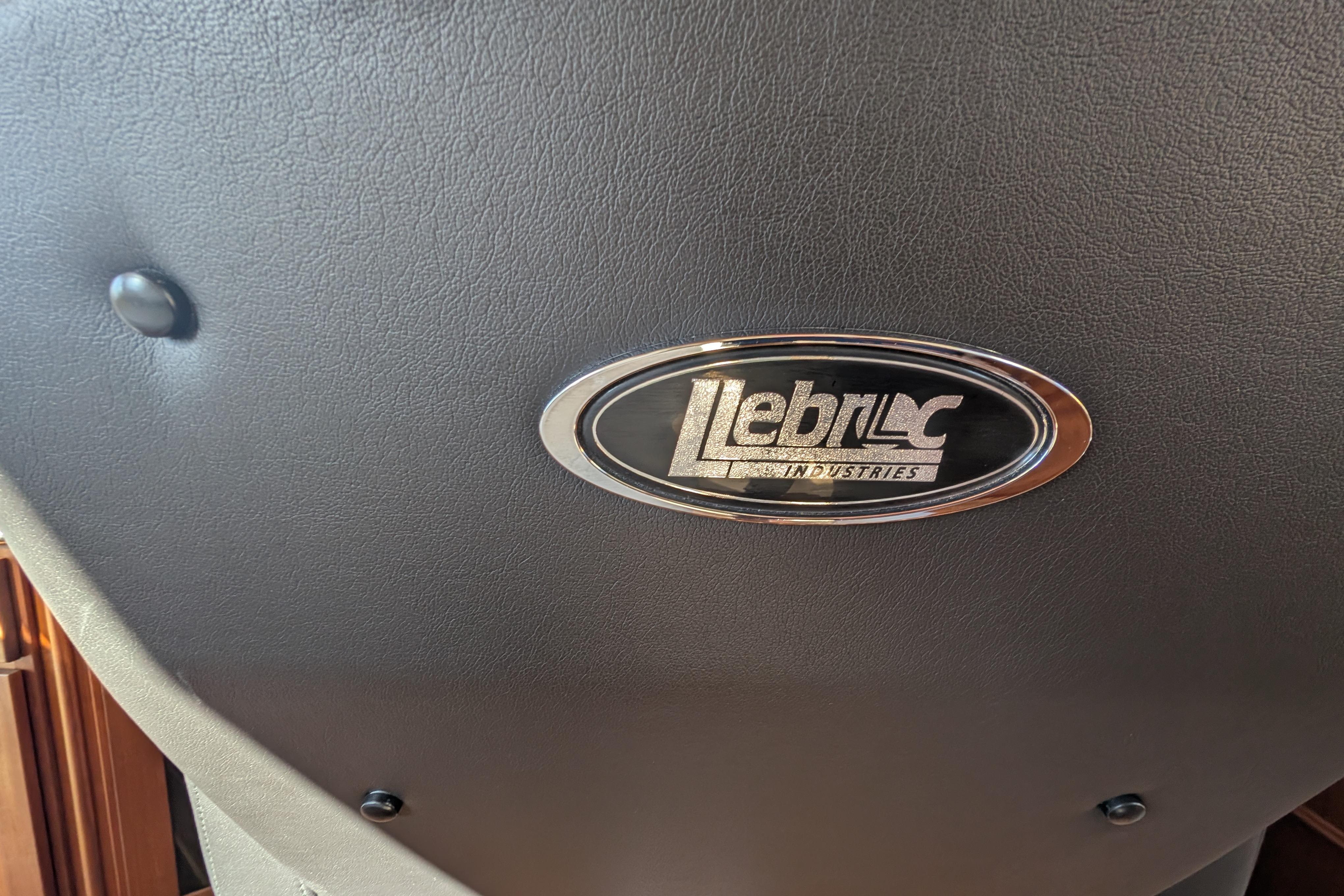 Leather seat with Lebroc Industries logo on a 2015 American Tug 435.