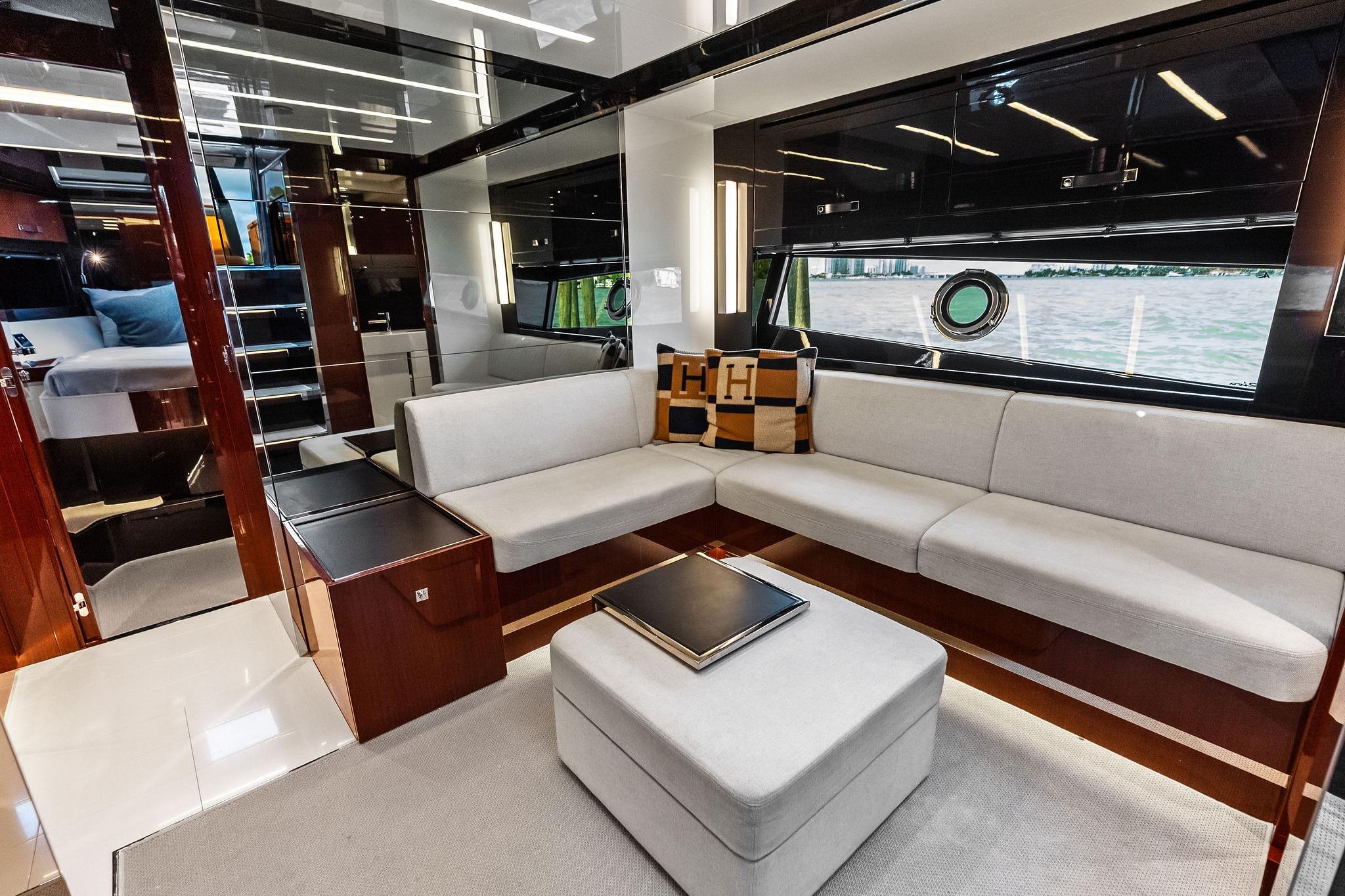 Luxurious interior of 2021 Riva 56 Rivale yacht with elegant seating and modern design.
