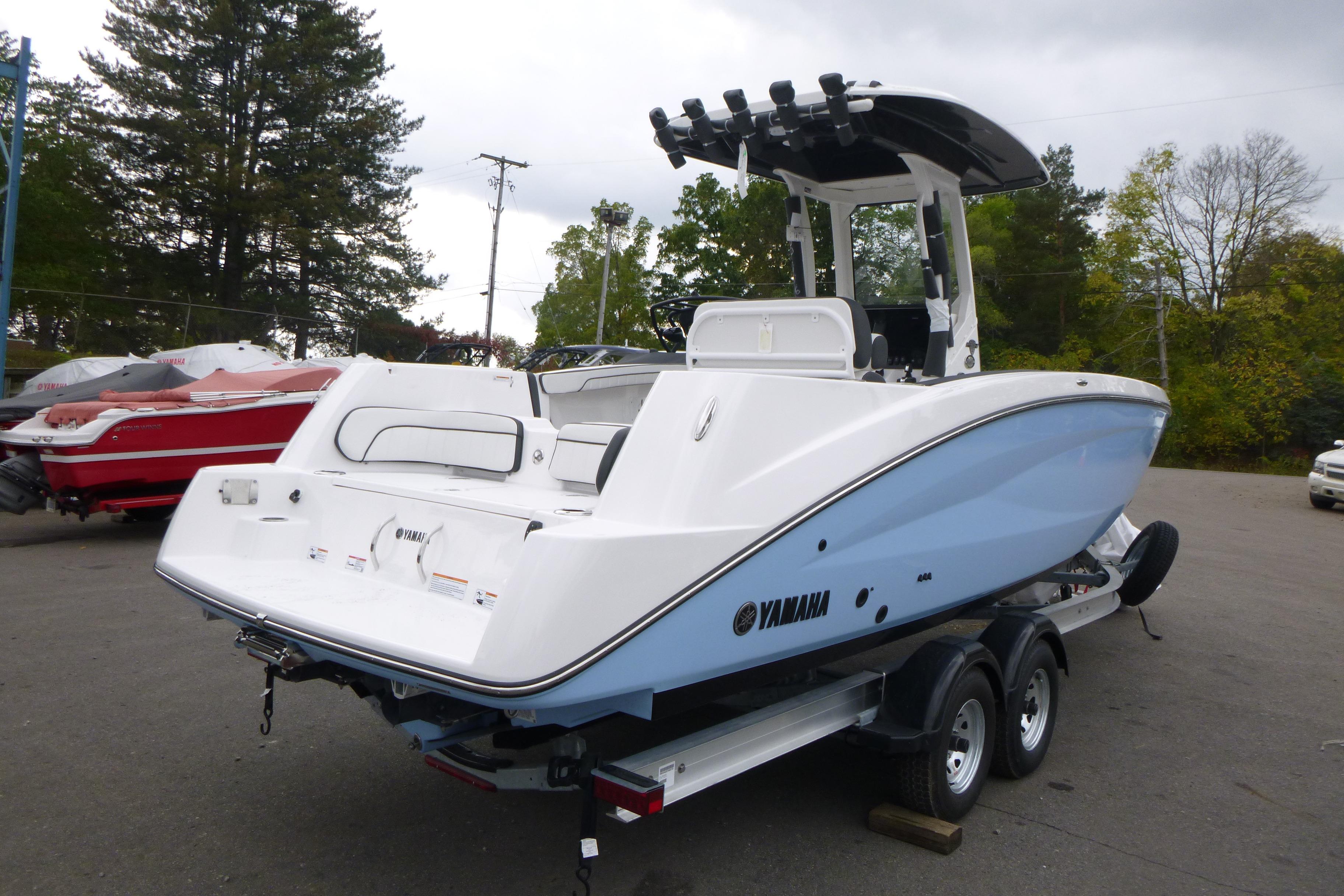 2026 Yamaha Boats 255 FSH Sport H on trailer, parked outdoors.