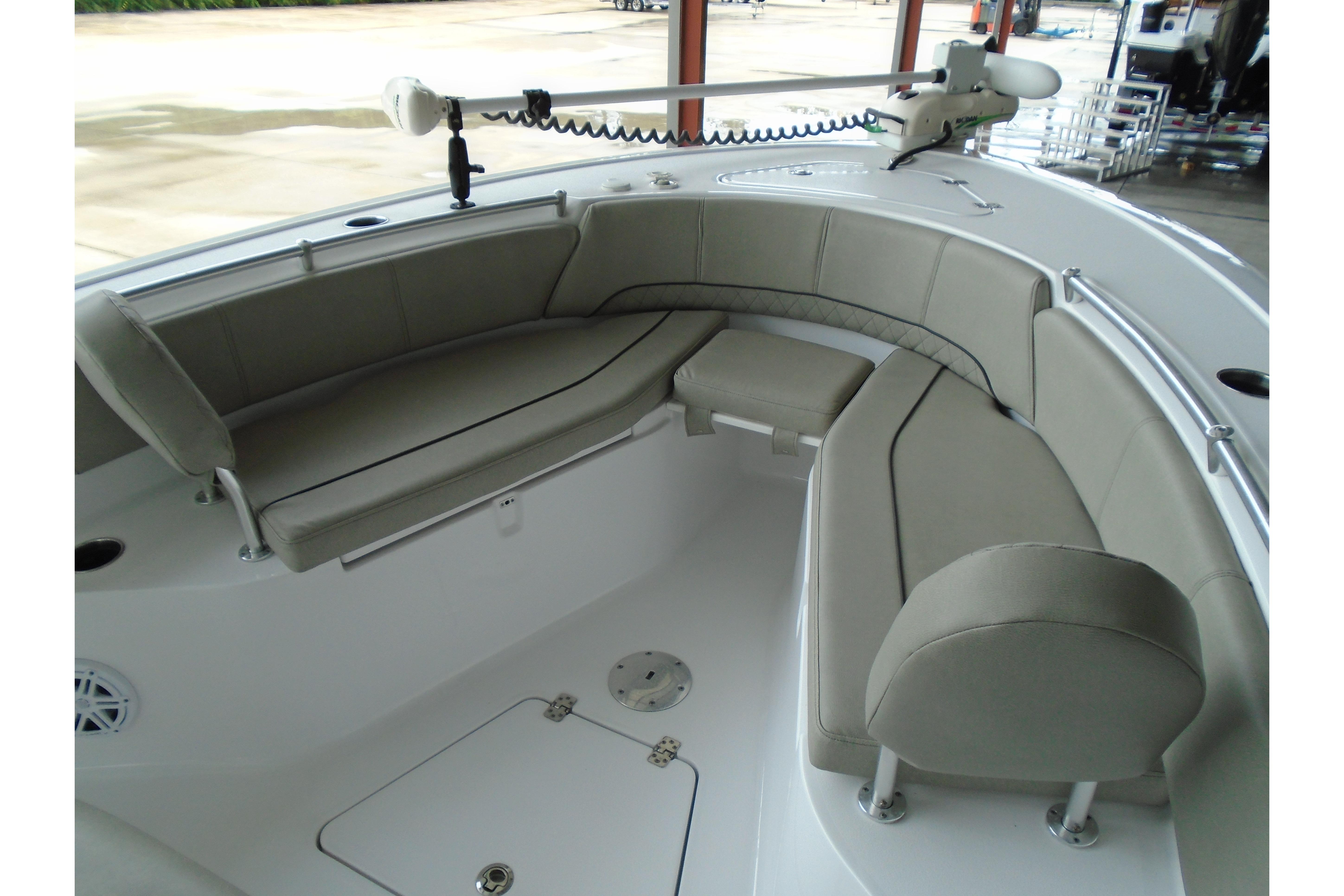 2022 Sportsman Heritage 241 Center Console boat with spacious seating area.