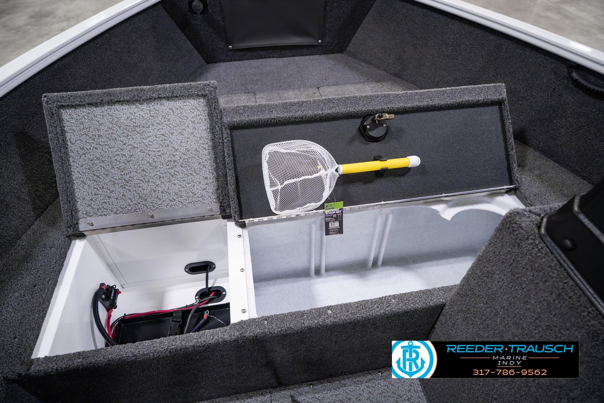 2026 Lund 1650 Rebel XL SS boat interior with storage compartments and fishing net.