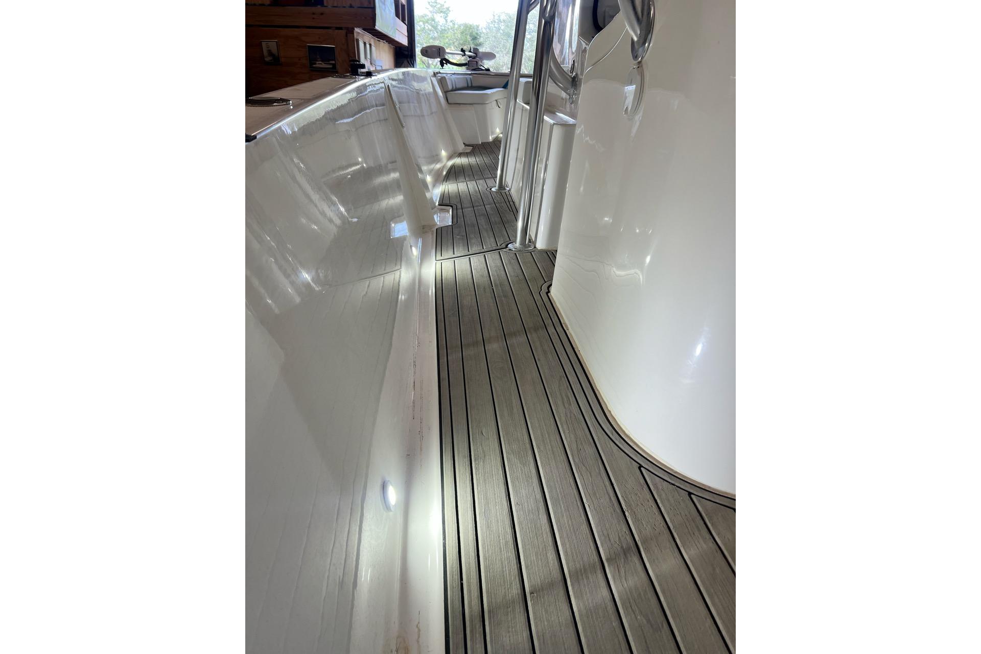 Custom Infusion 34 CC 2021 boat deck with sleek design and modern finish.