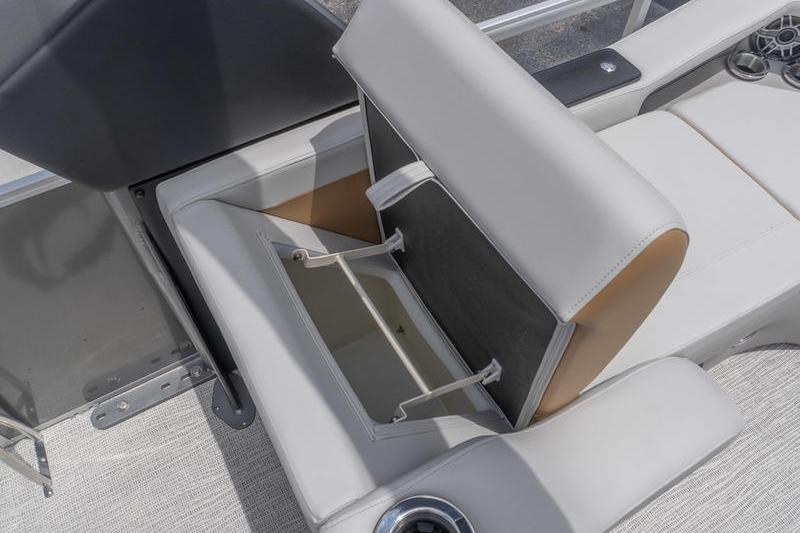 SunCatcher Elite 326 SS 2026 boat seat with open storage compartment.