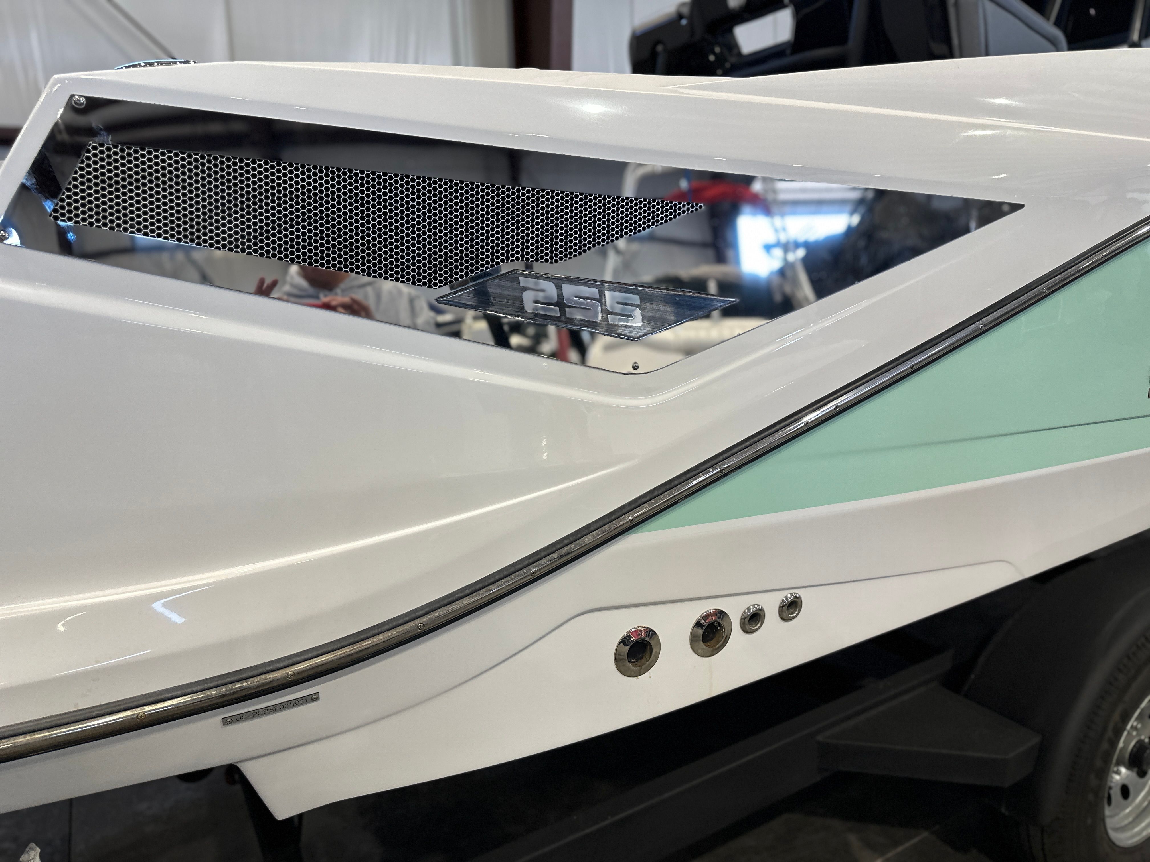 Close-up of the 2021 Scarab 255 Open ID boat with a sleek design.