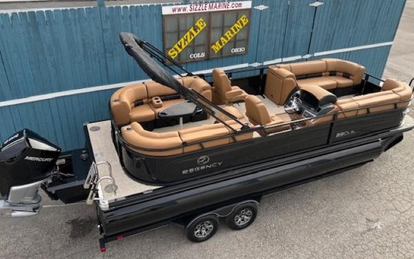 2025 Regency 230 LE3 pontoon boat on trailer at Sizzle Marine dealership.