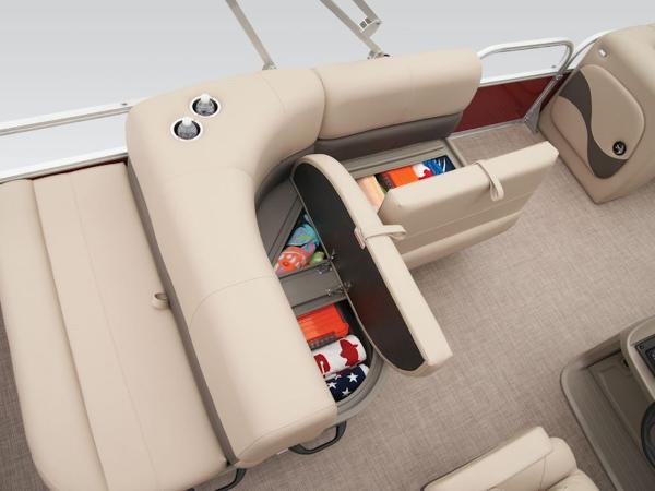 2024 Sun Tracker PARTY BARGE® 18 DLX interior storage compartments with beige seating.