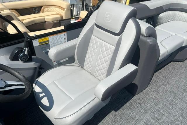 Luxurious seating on 2026 Godfrey Sweetwater 2286 SBC pontoon boat, featuring quilted upholstery.