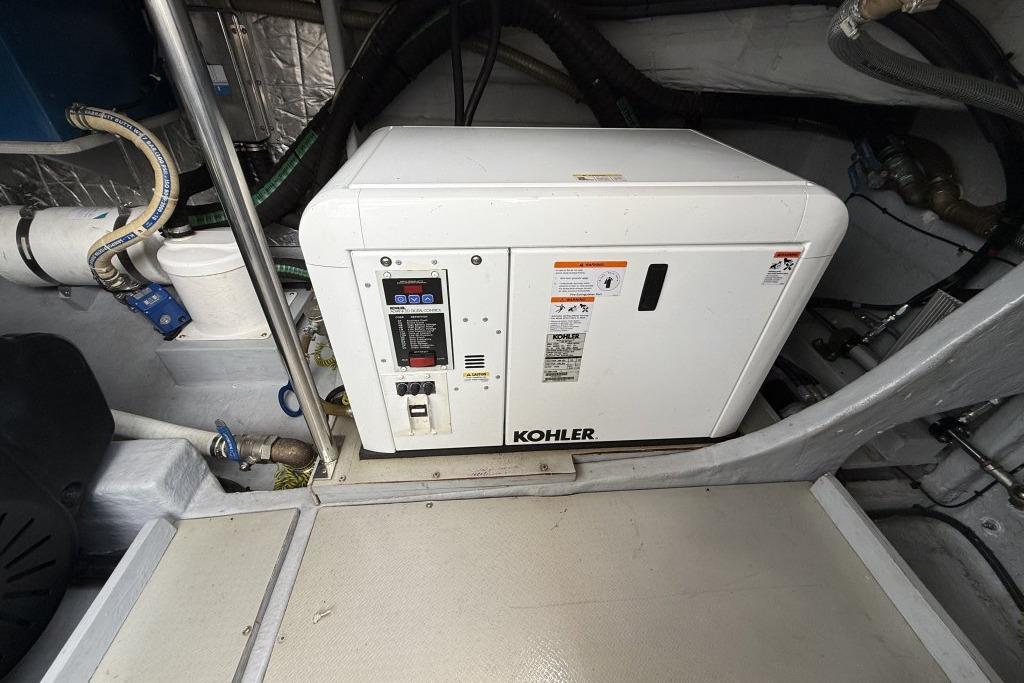 Engine room of 2012 Sasga Yachts Menorquin 42 with Kohler generator.