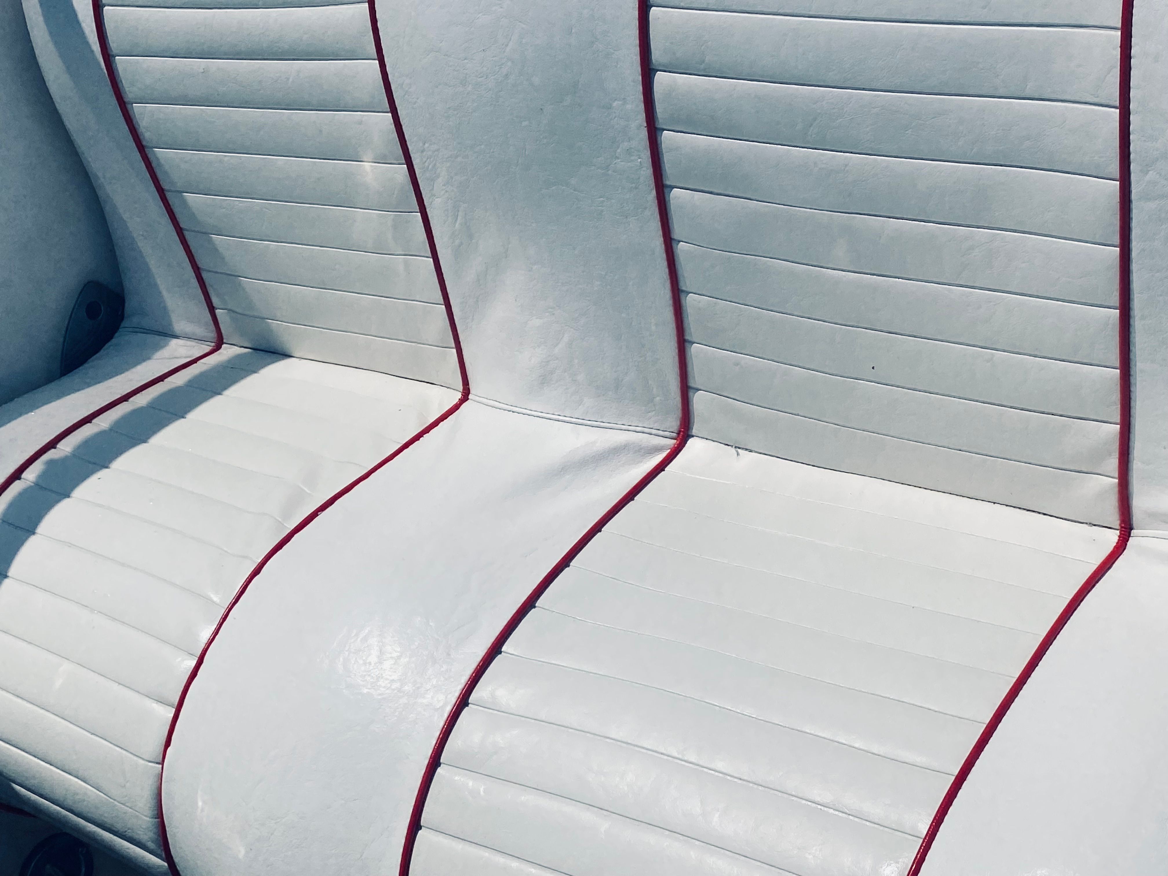 White leather seats with red stitching on Sunseeker Hawk 31, 1994 model.