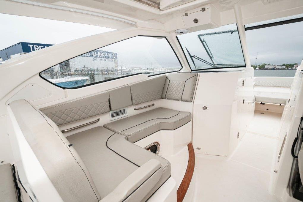 2023 Pursuit DC 365 Dual Console interior with elegant seating and modern design.