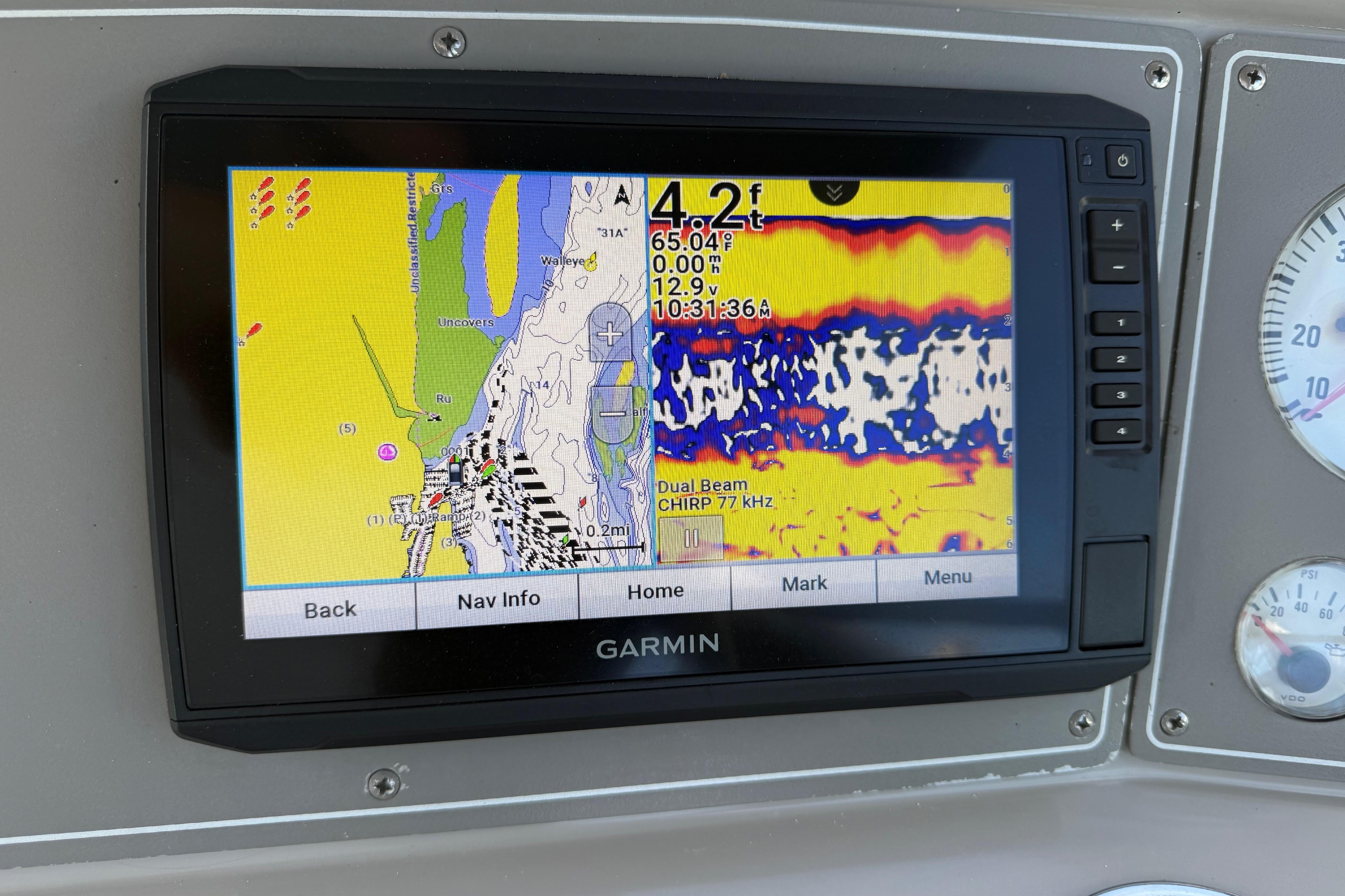 Garmin navigation display on 1999 Formula 34 Performance Cruiser showing depth and sonar data.