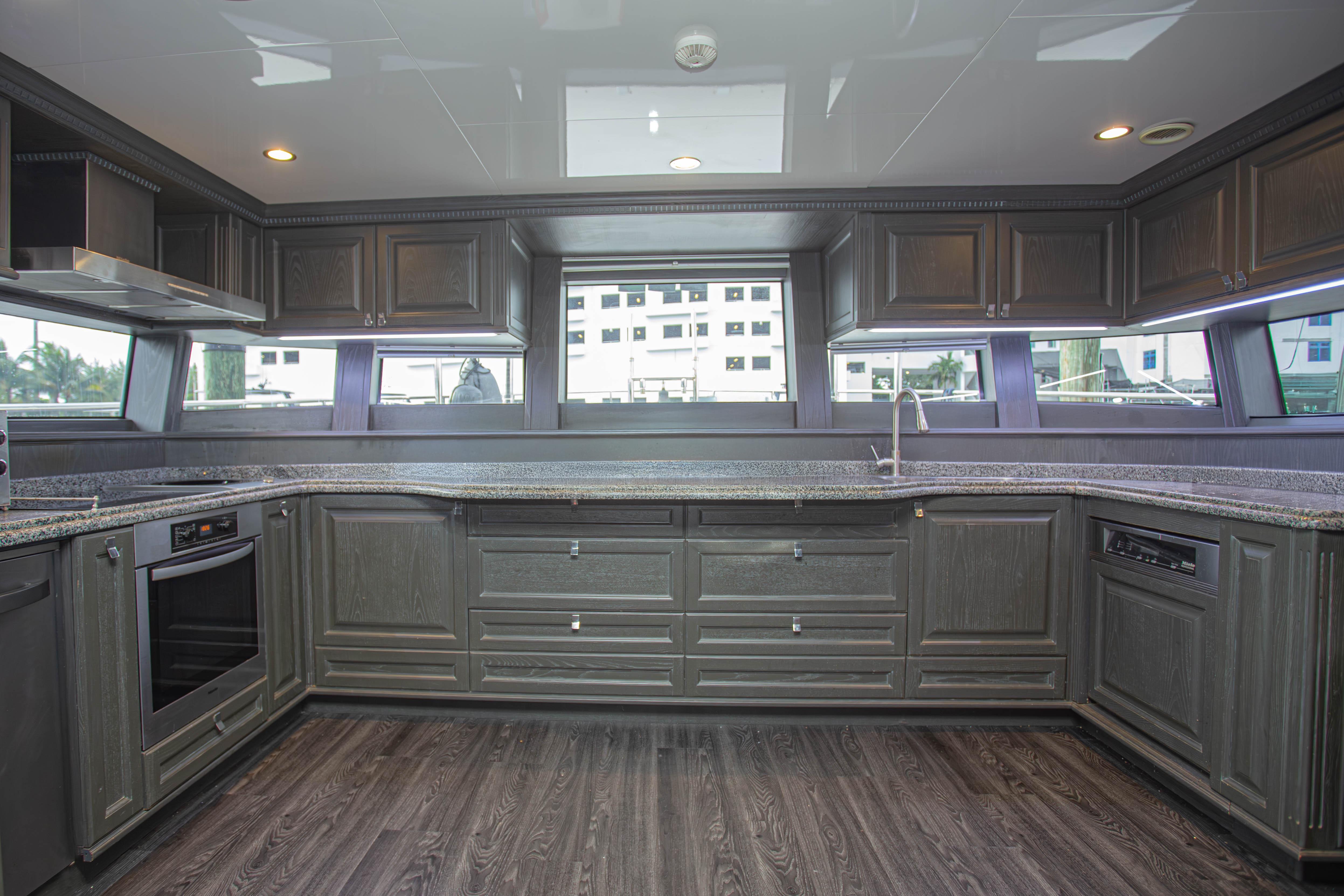 Luxurious kitchen interior of 2014 Fifth Ocean Yachts 24m Displacement Explorer Yacht.
