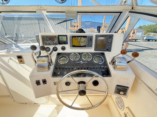 2001 Albemarle 280 Express Sport Fisherman helm with gauges, controls, and navigation equipment.