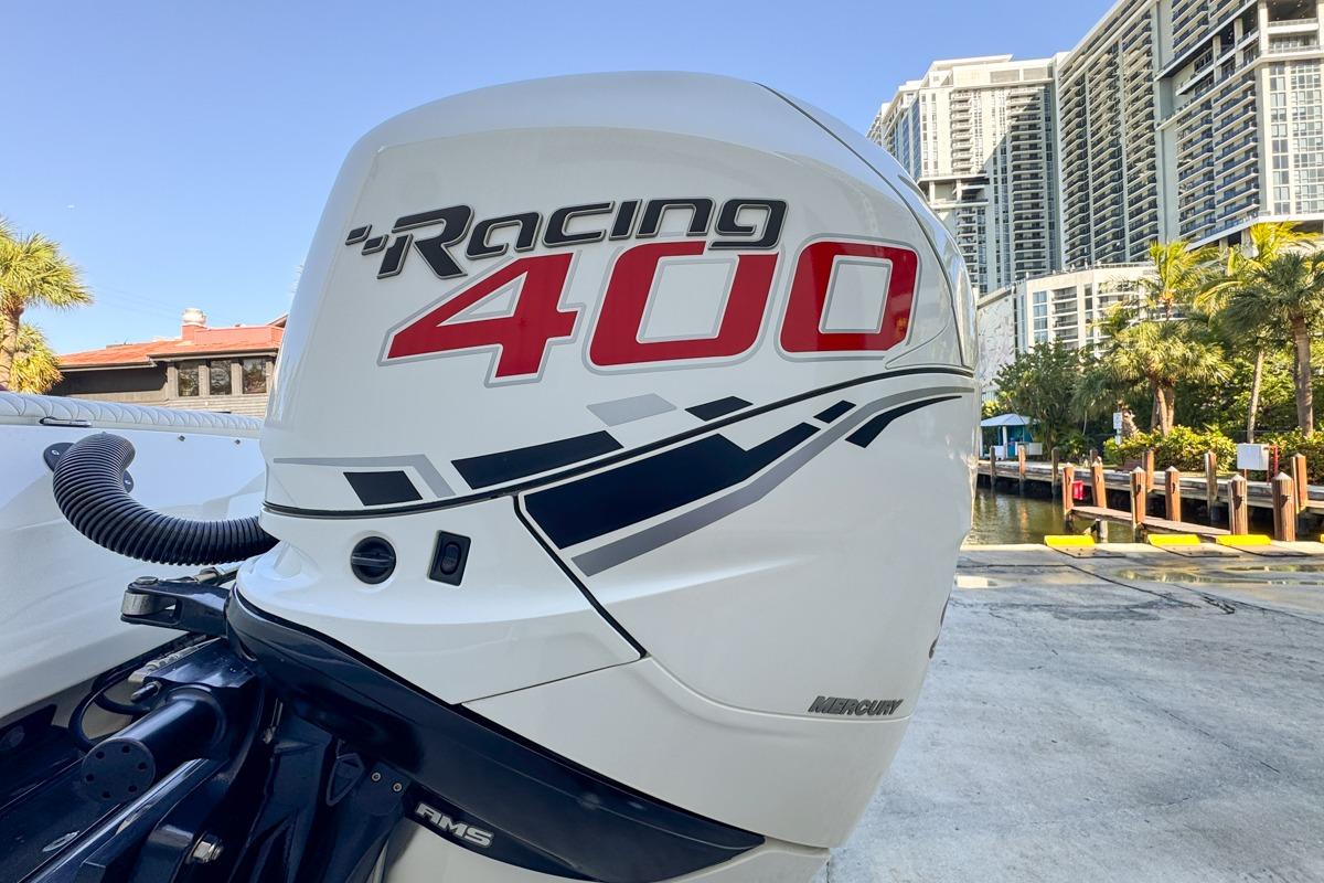 Outboard motor on 2022 Velocity 290sc boat, featuring Racing 400 branding.