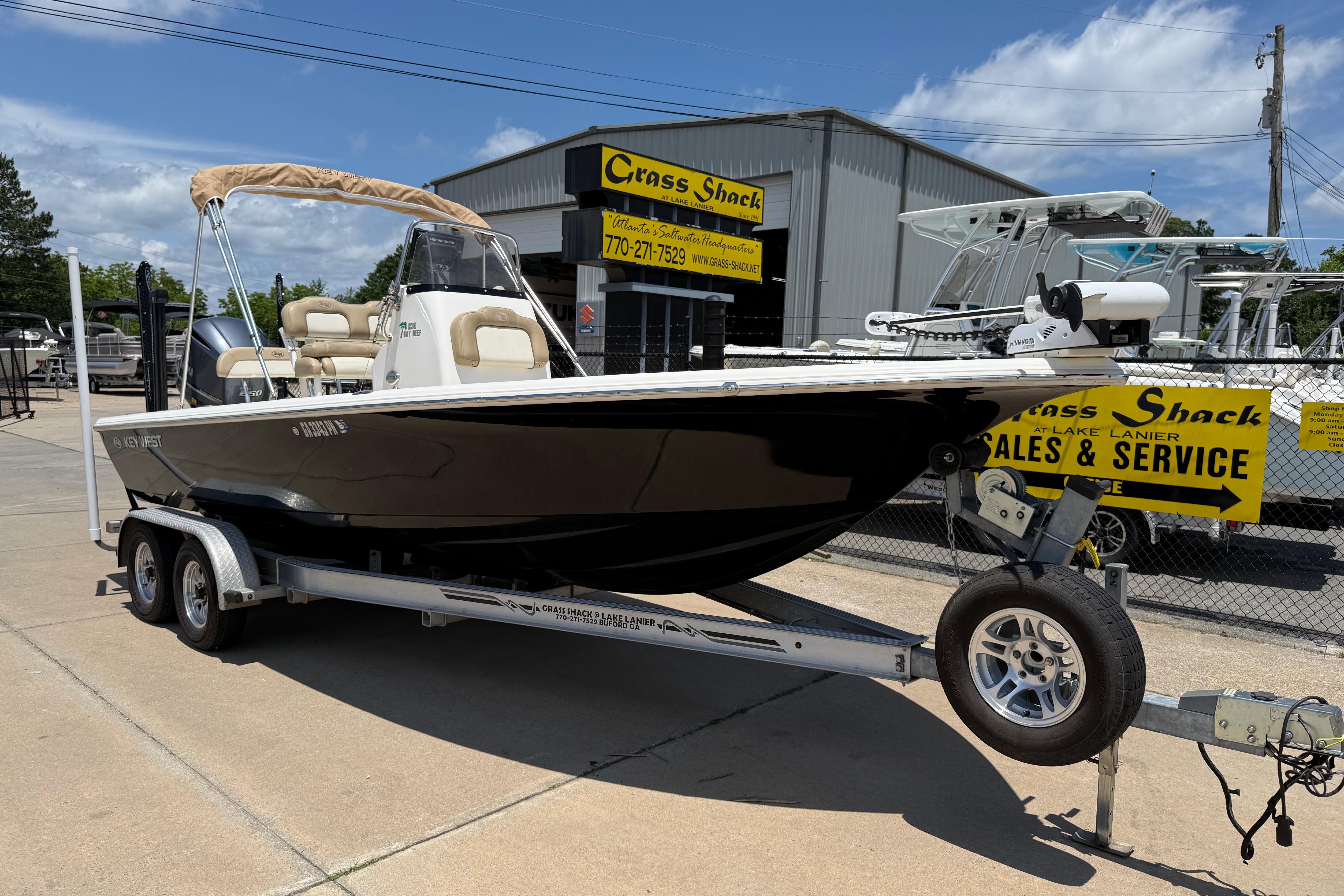 2019 Key West 230 Bay Reef boat on trailer at sales and service center.