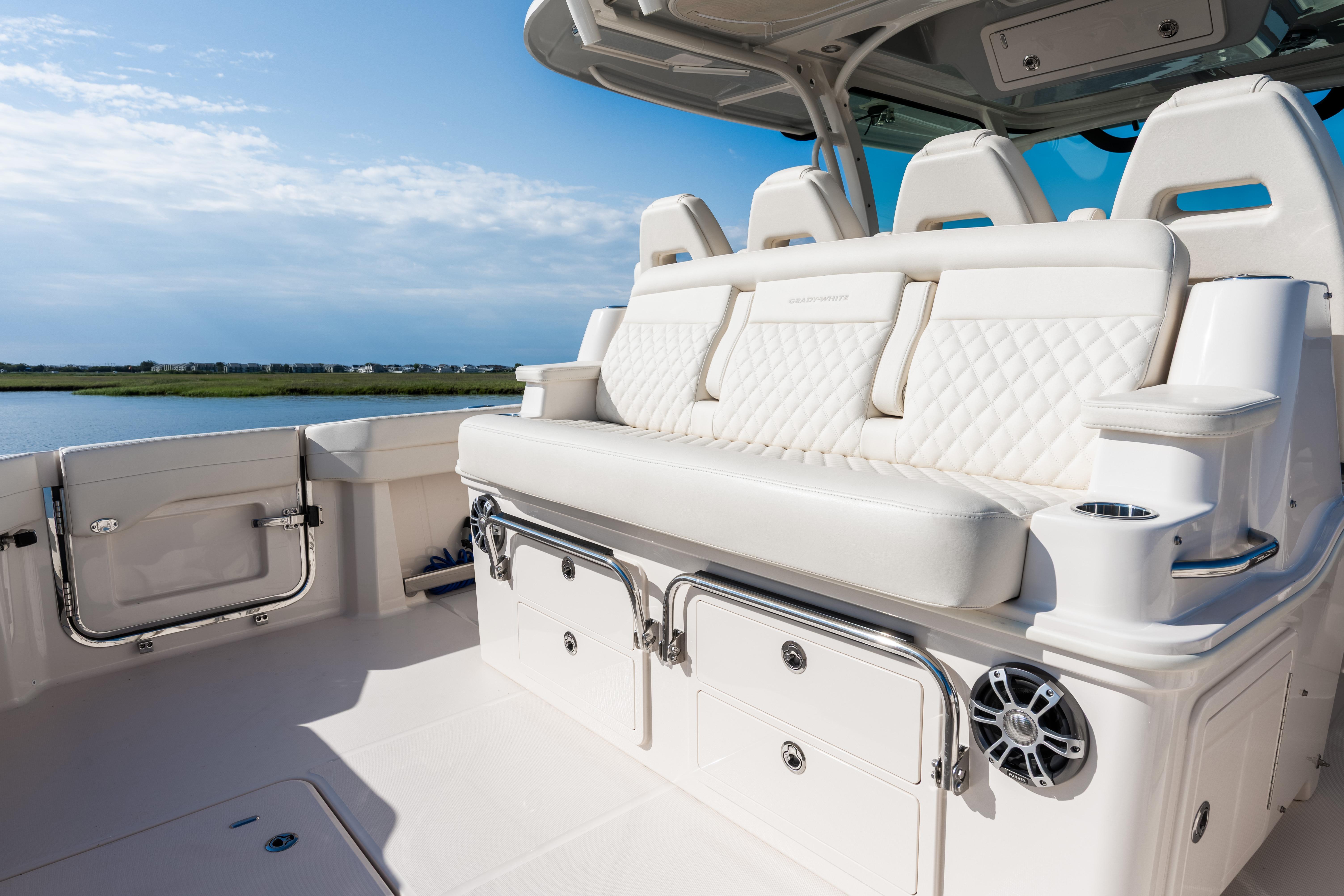2025 Grady-White Canyon 386 boat interior with luxurious seating and storage.