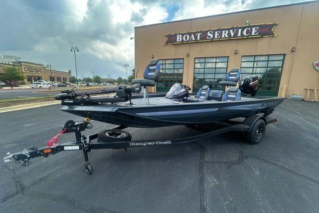 2026 Ranger RT178 boat parked outside a boat service center.