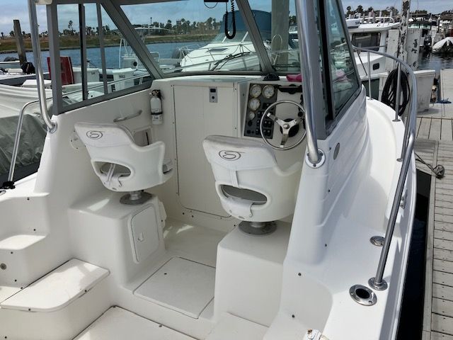 Interior of a 2011 Seaswirl Striper boat docked at the marina.