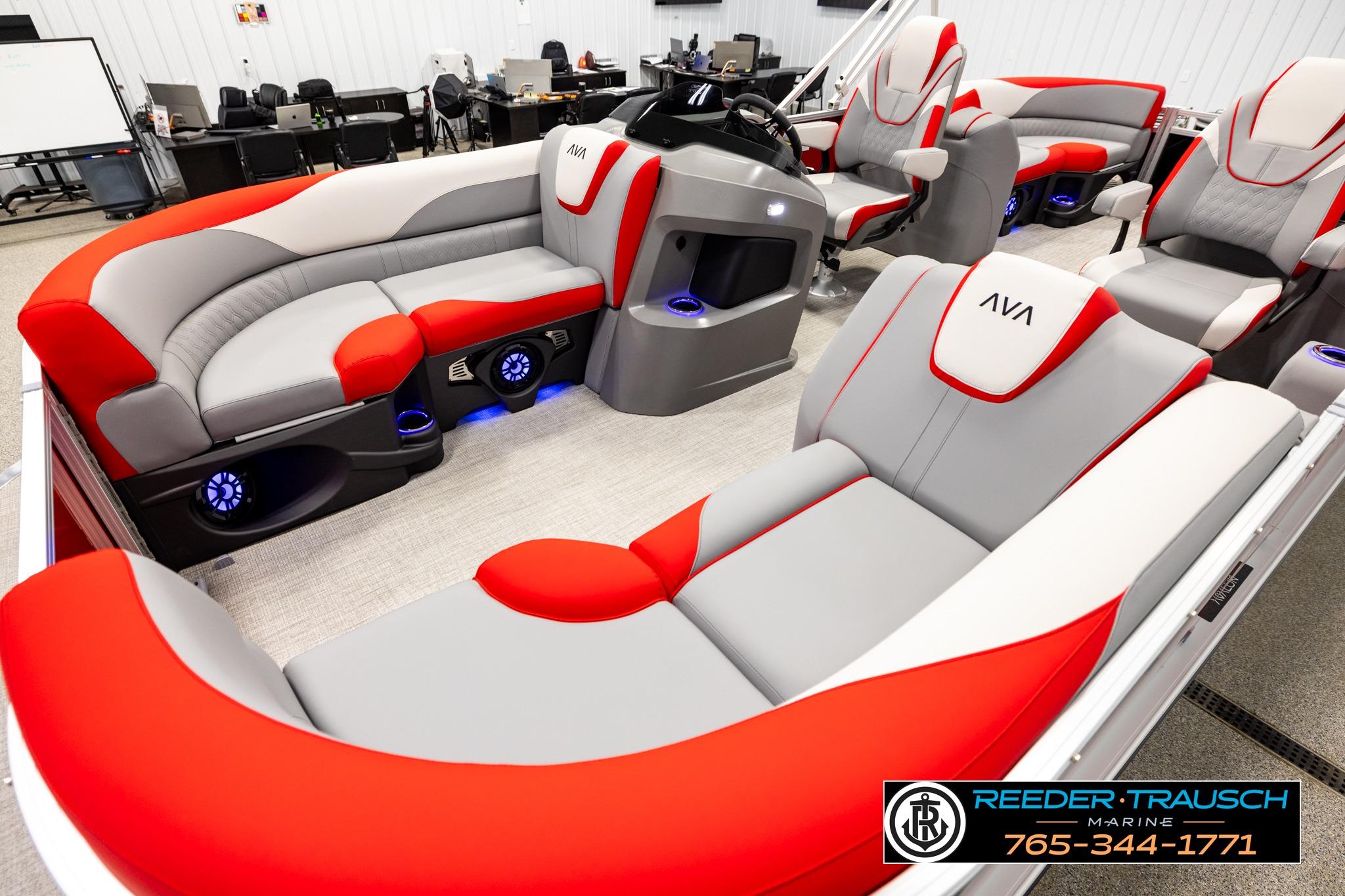Luxurious 2026 Avalon LSZ QL pontoon boat interior with red and gray seating, featuring modern design.