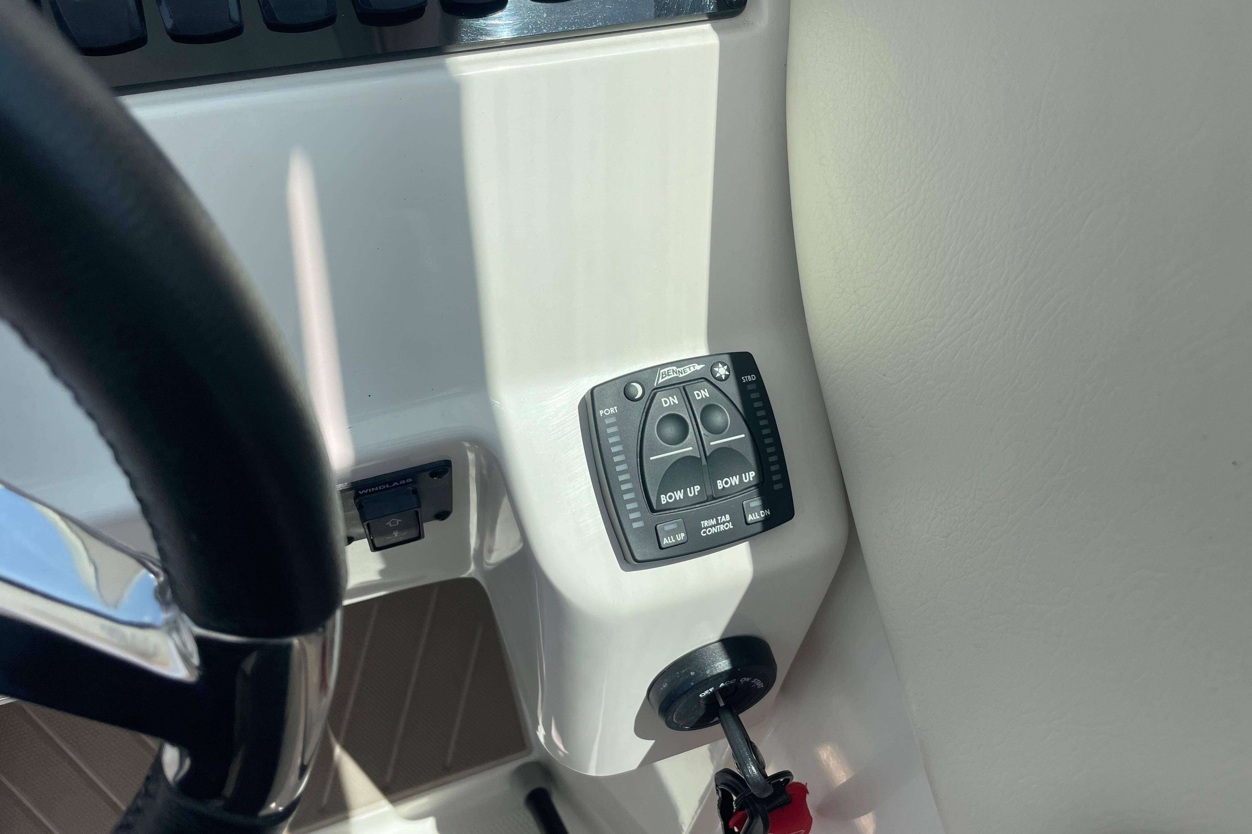 2022 Sailfish 245 DC boat helm with trim tab control panel.