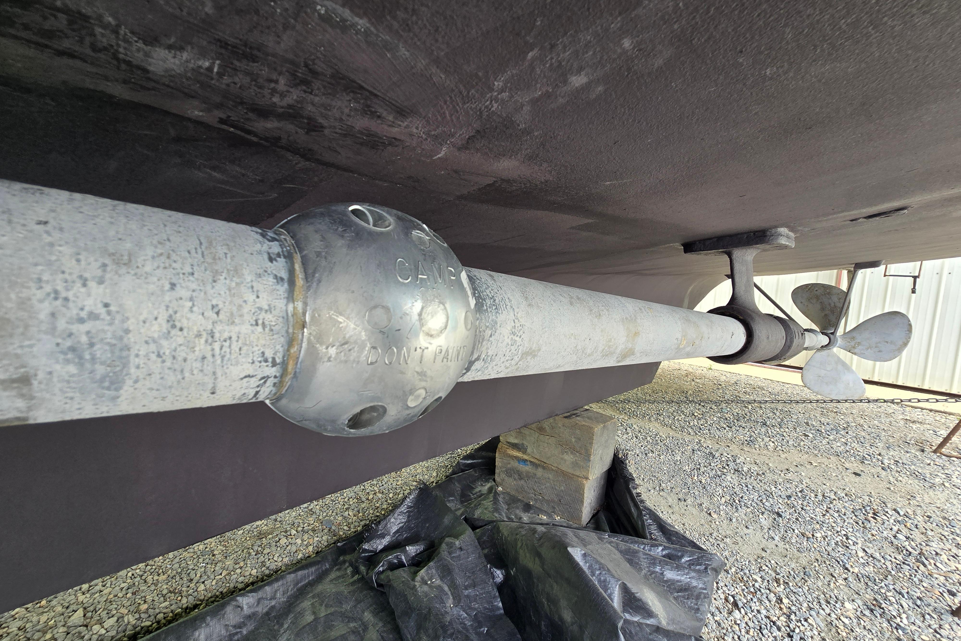 Propeller shaft and anode of a 1980 Hatteras 70 Motor Yacht, under maintenance.
