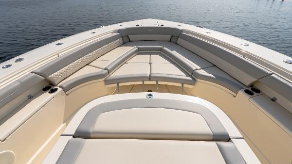 2025 Scout 425 LXF boat interior with luxurious seating and sleek design on calm water.