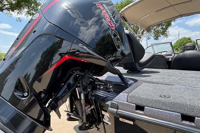 2026 Ranger 212LS boat with powerful Mercury Pro XS outboard motor, parked outdoors.
