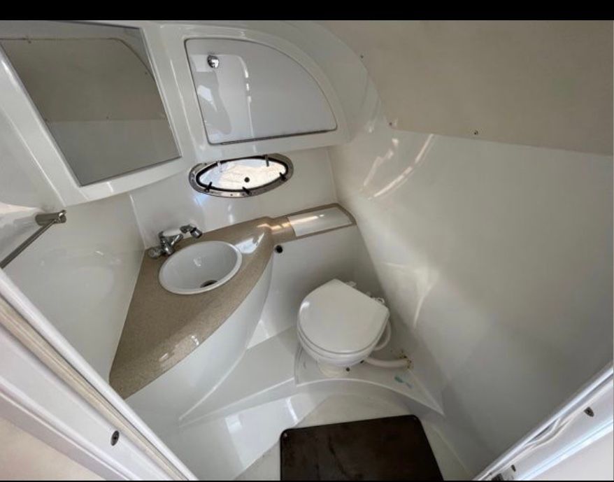Interior of a 1999 Cobalt 293 yacht bathroom.