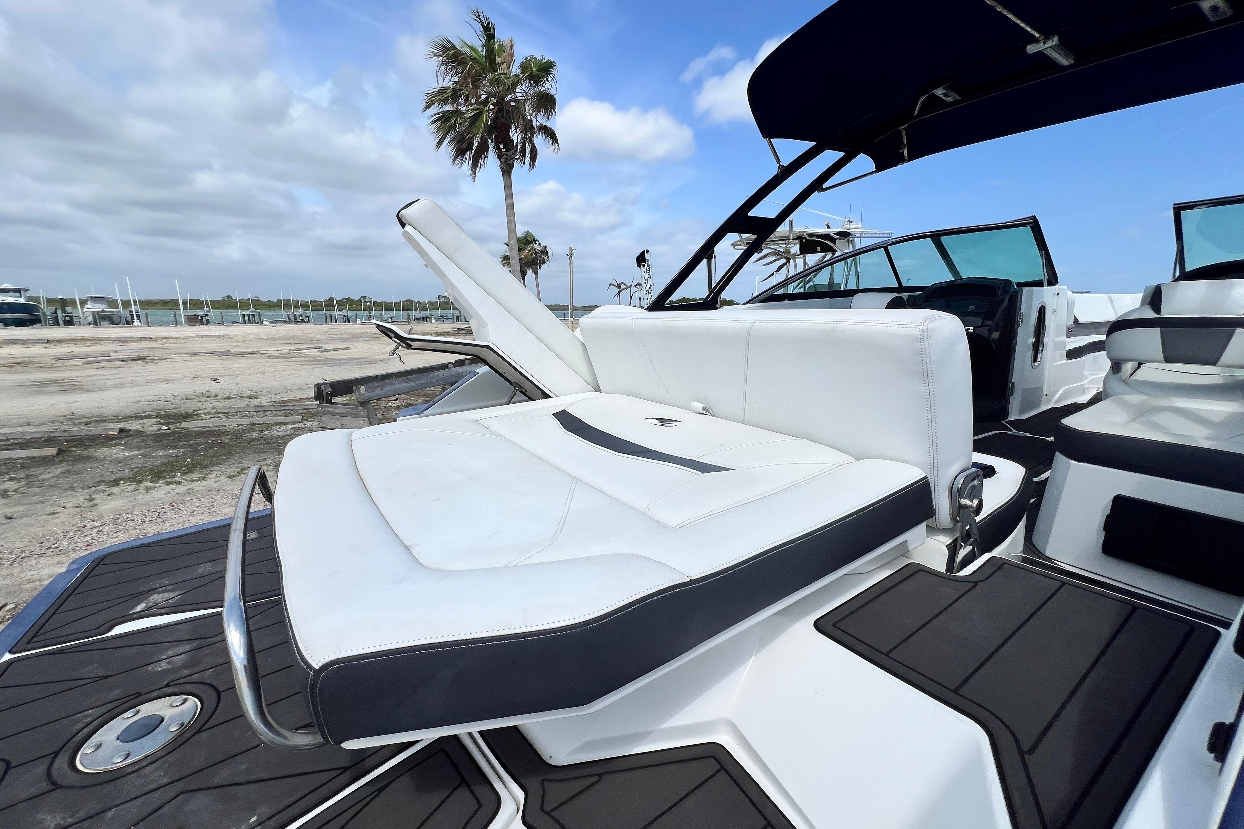 2015 Monterey 268SS Super Sport boat with white seating and sleek design.