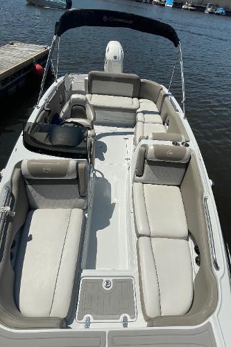 2020 Crownline E 205 XS boat with spacious seating on the water.