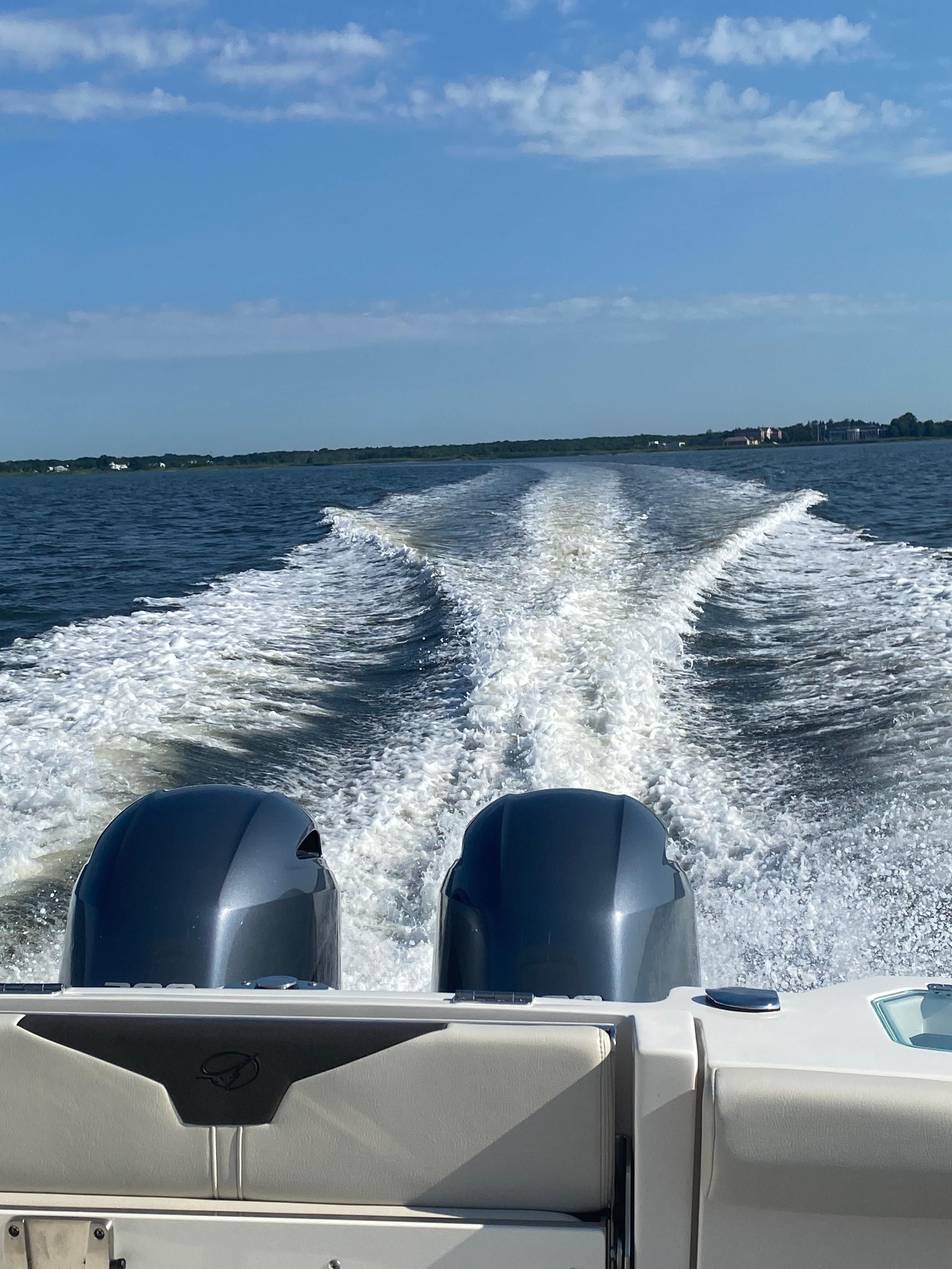 Sailfish 276 DC boat on water, 2022 model.