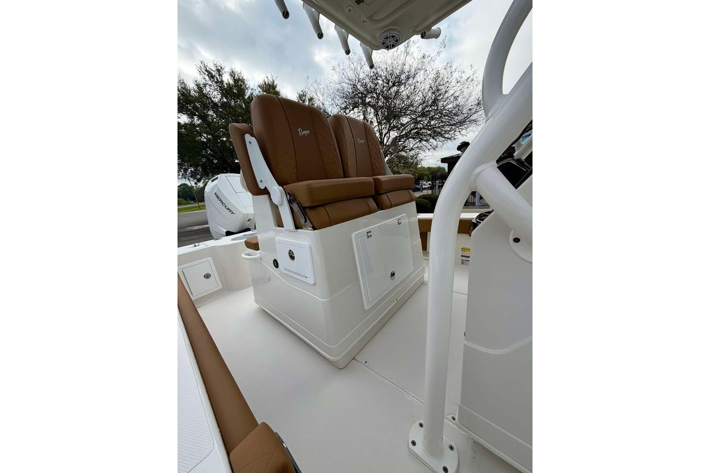 2026 Ranger 2600 Bay boat interior with brown seating and white console.