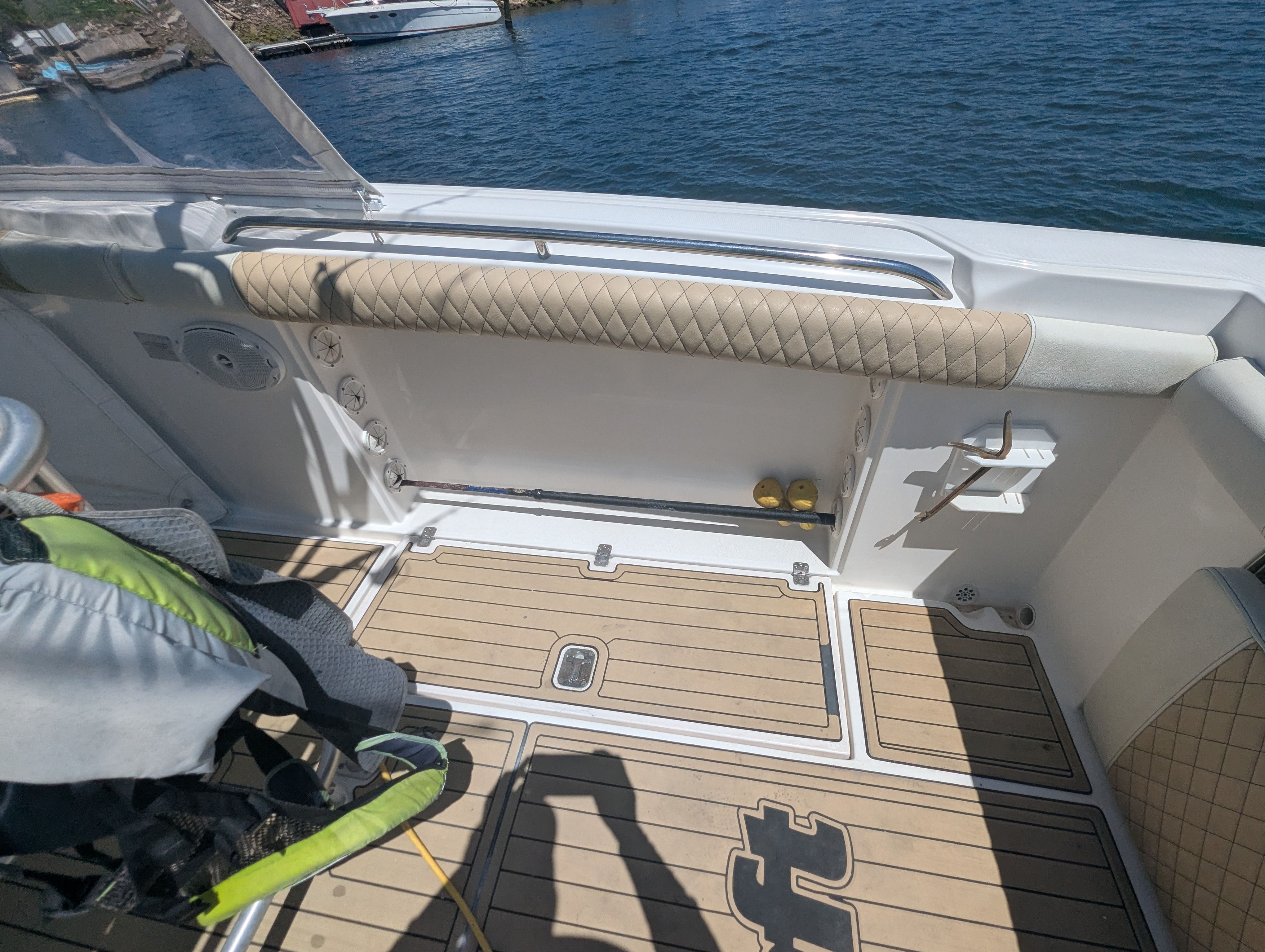 Interior of a 2005 Wellcraft 35 CCF boat by the water.