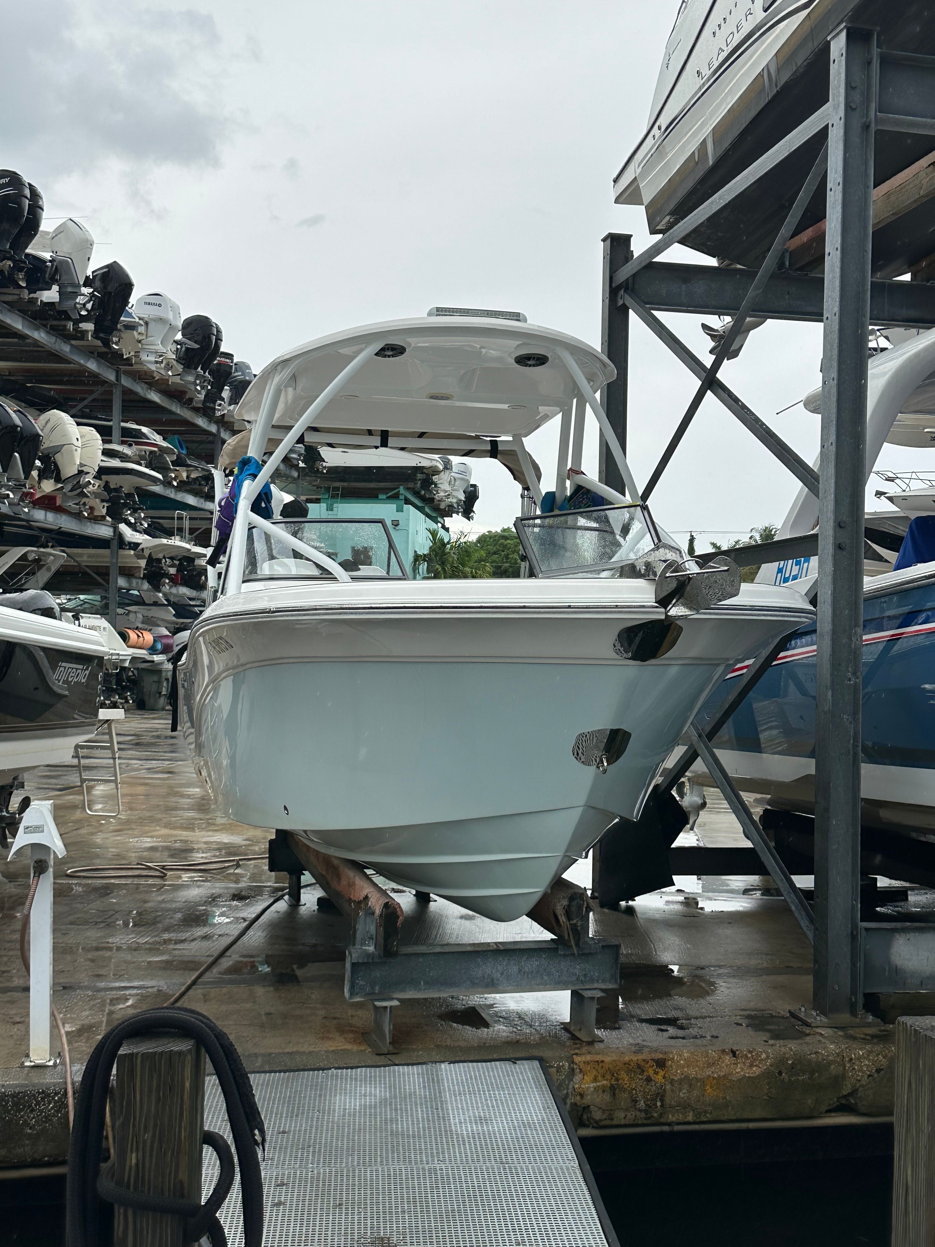Sea Fox 226 Traveler 2021 on a boat trailer at the marina.