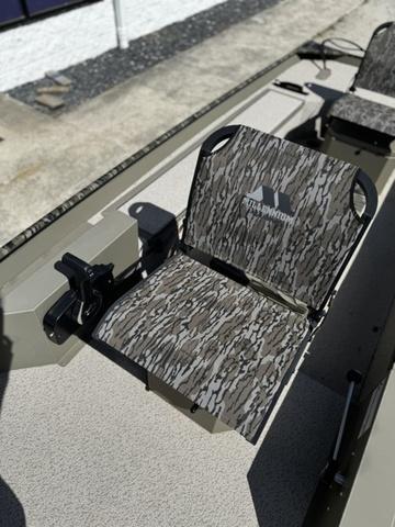 2024 SeaArk 31652 CRAPPIE boat with camouflage seating, ideal for fishing.