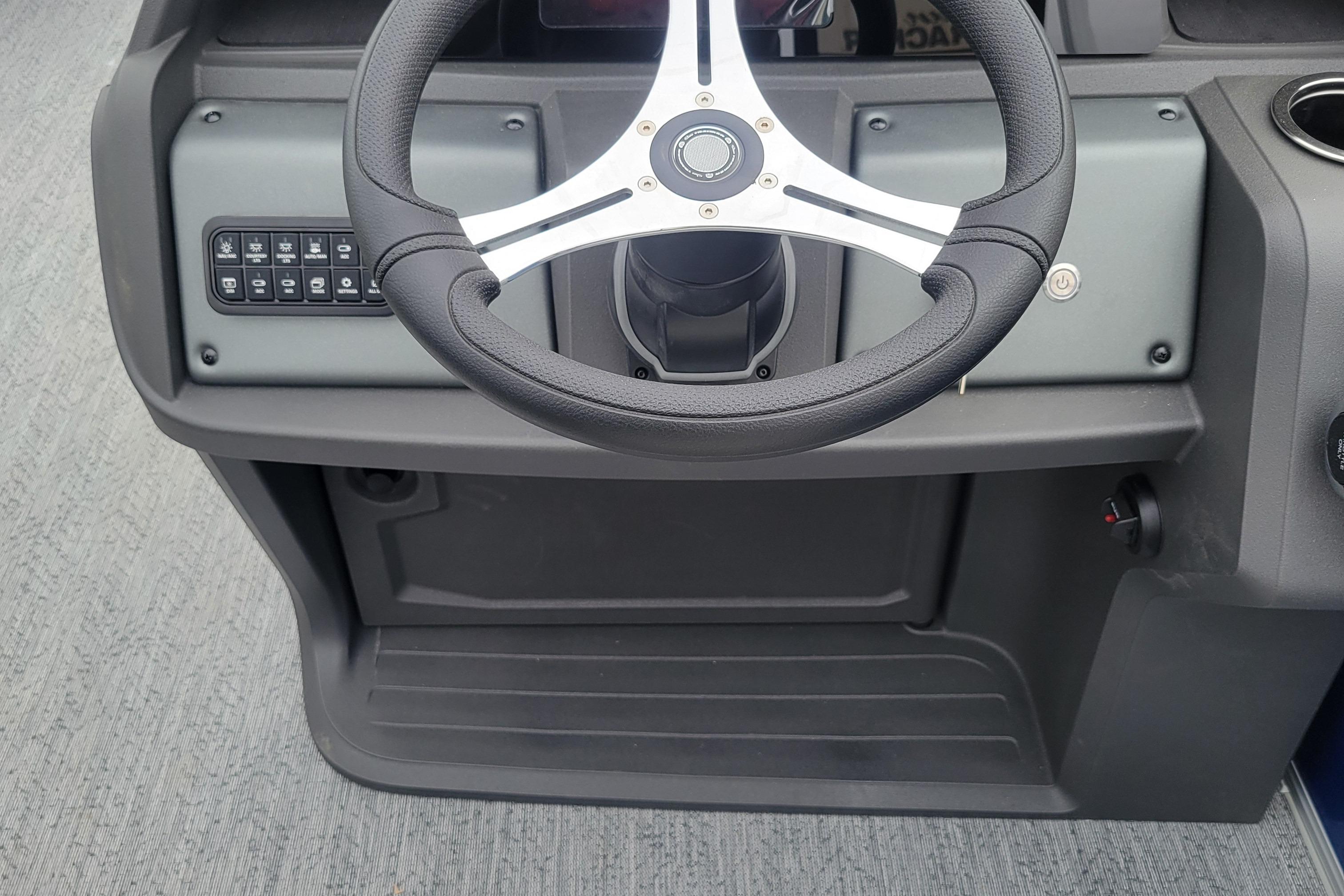 Steering console of 2026 Sun Tracker Fishin' Barge 20 DLX pontoon boat.