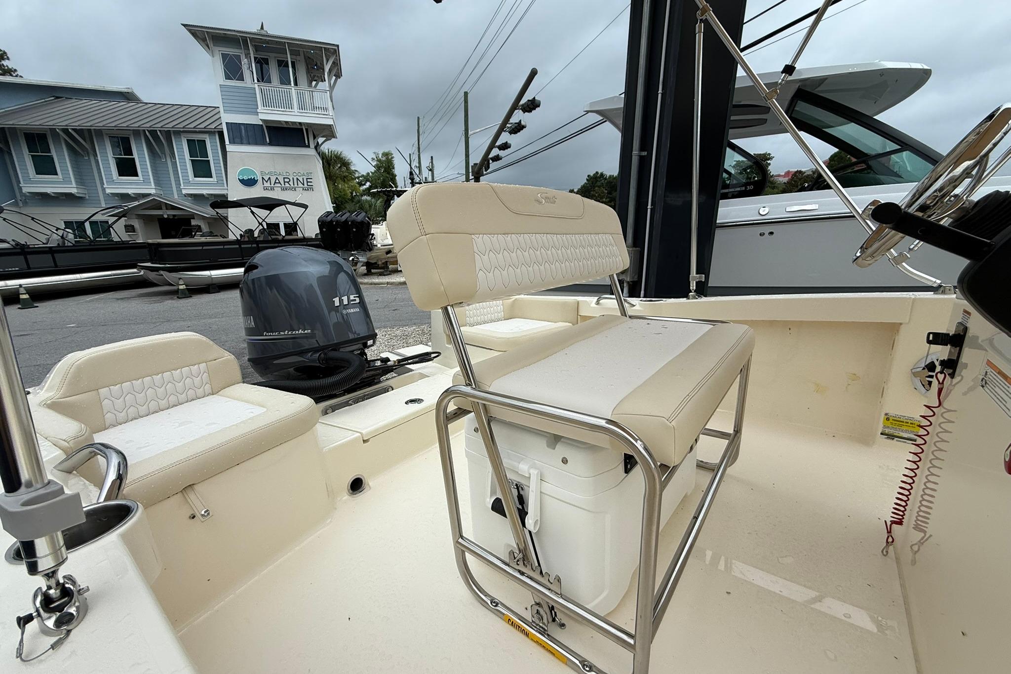 2027 Scout 188 Sportfish boat interior with seating and Yamaha 115 engine.
