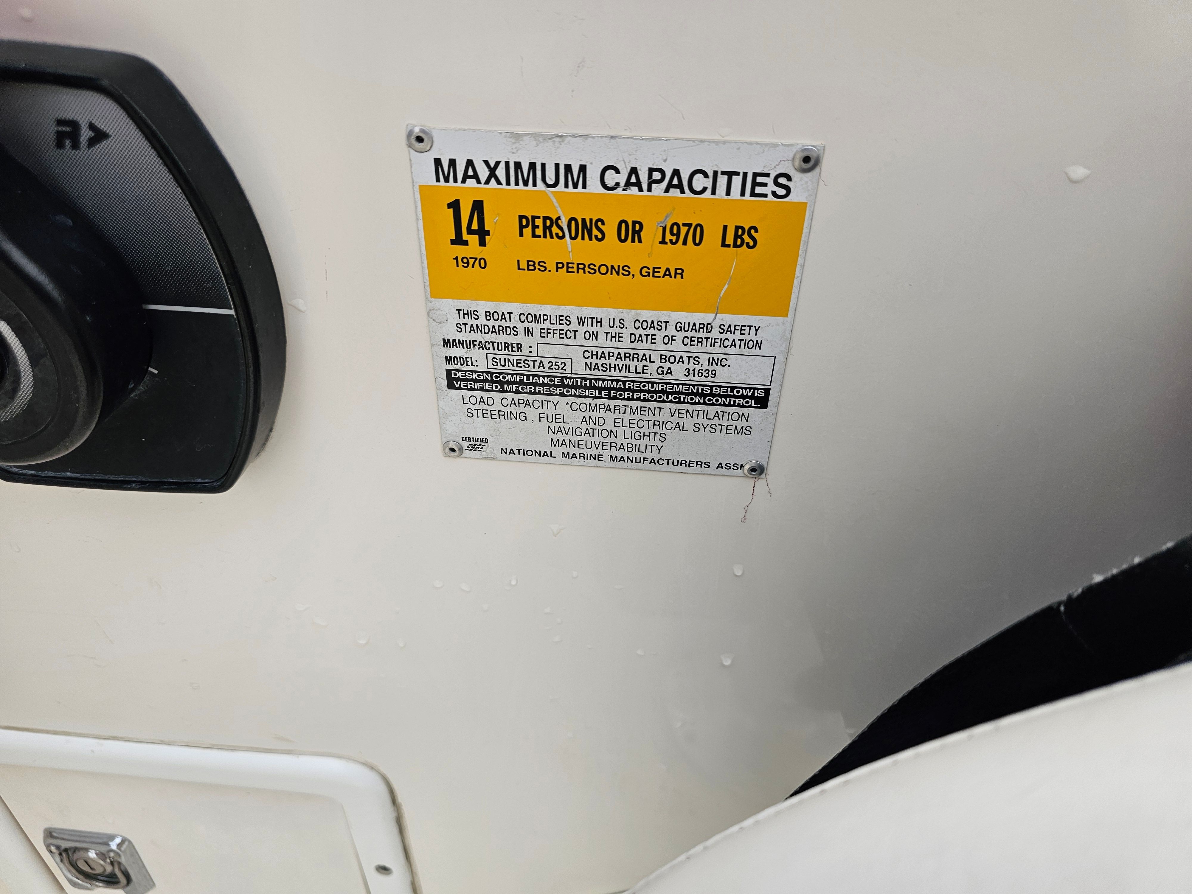 Capacity label for 14 persons or 1970 lbs on Chaparral Sunesta 252.