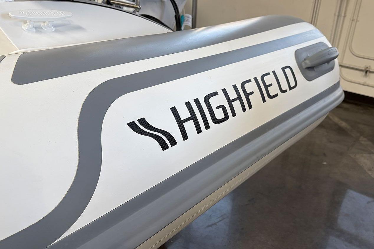 2026 Highfield Sport 460 boat, featuring sleek design and prominent branding.