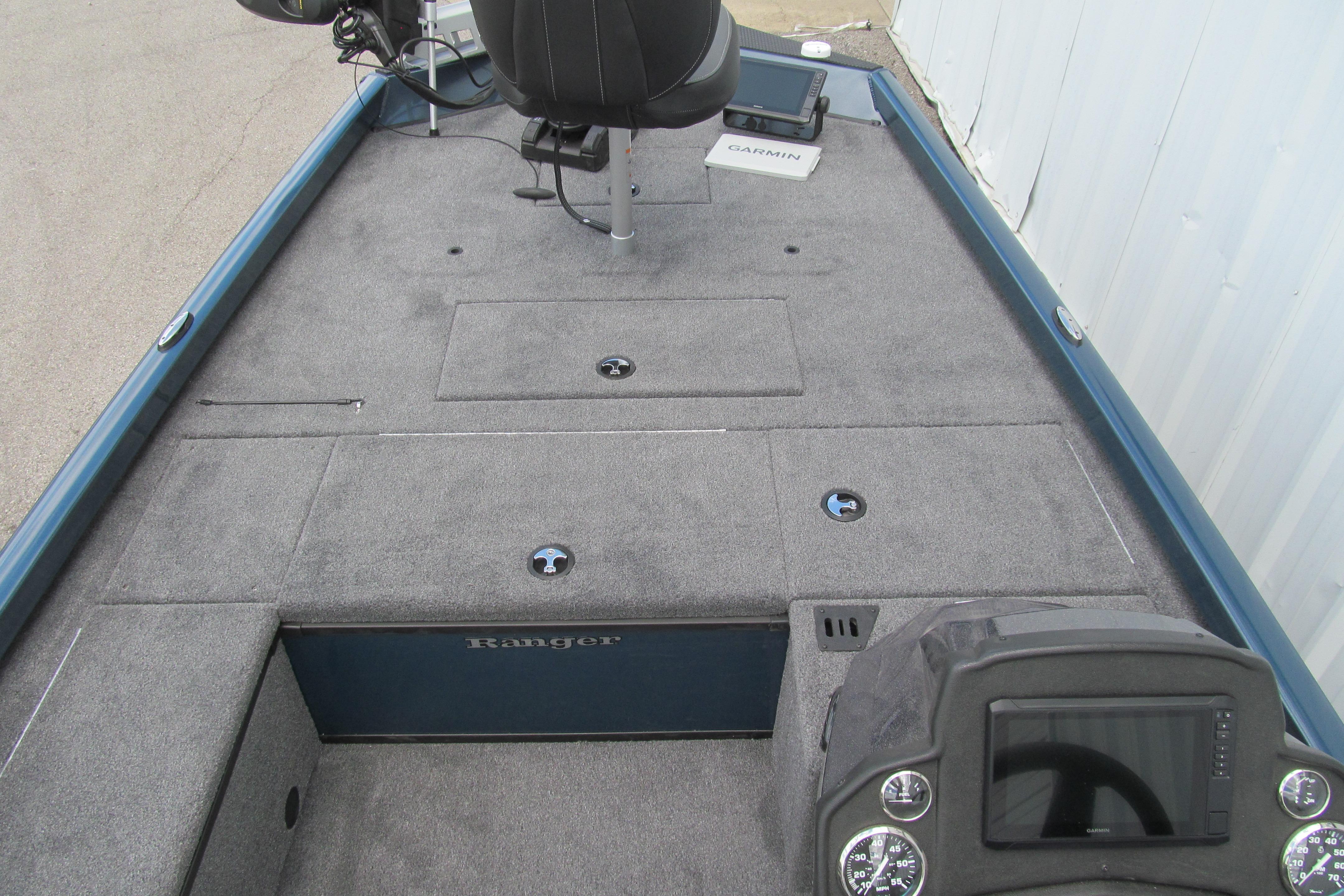2026 Ranger RT188C boat interior with carpeted deck and Garmin electronics.