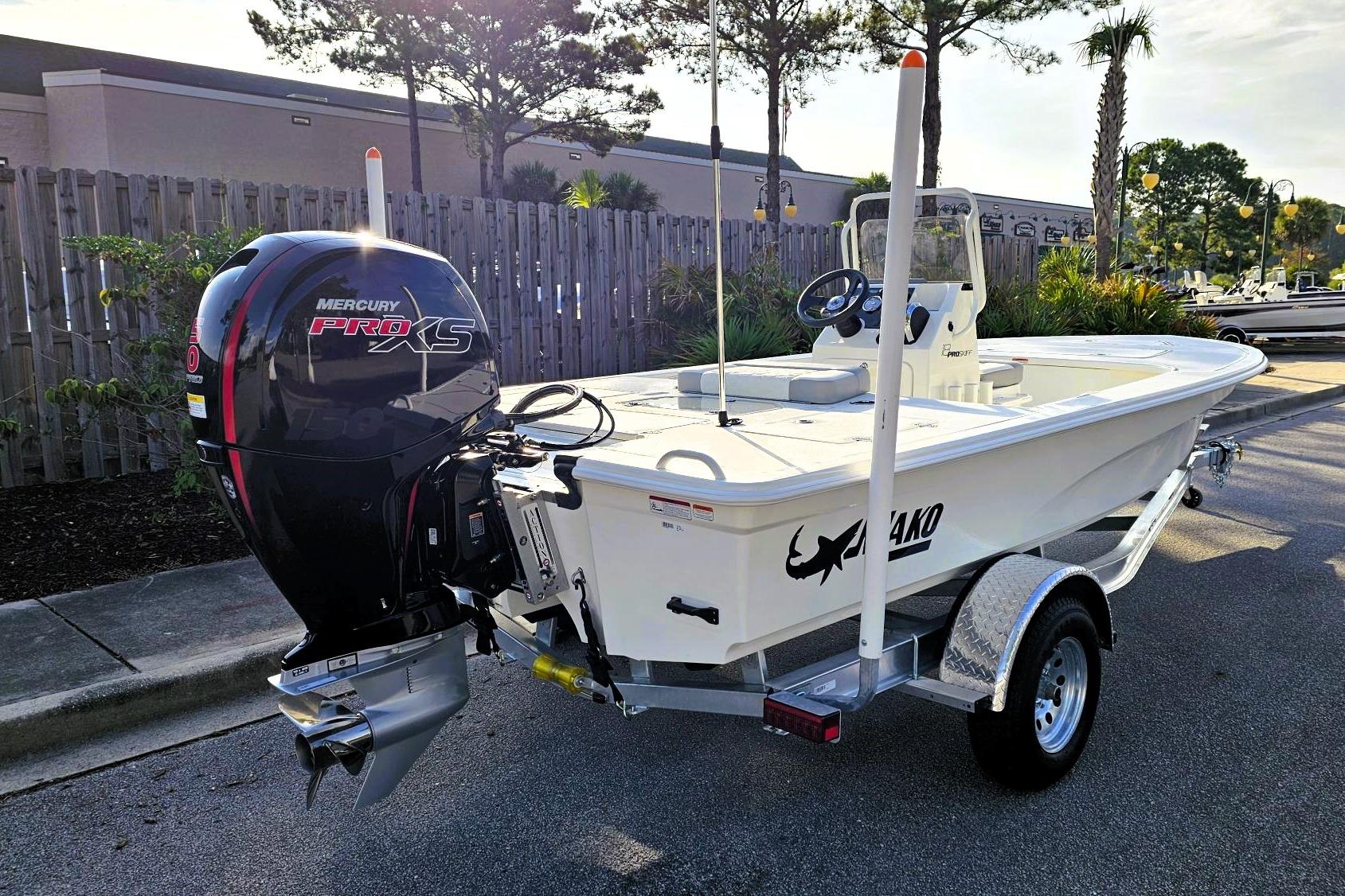 2026 Mako 18 Pro Skiff boat with Mercury Pro XS engine on trailer.