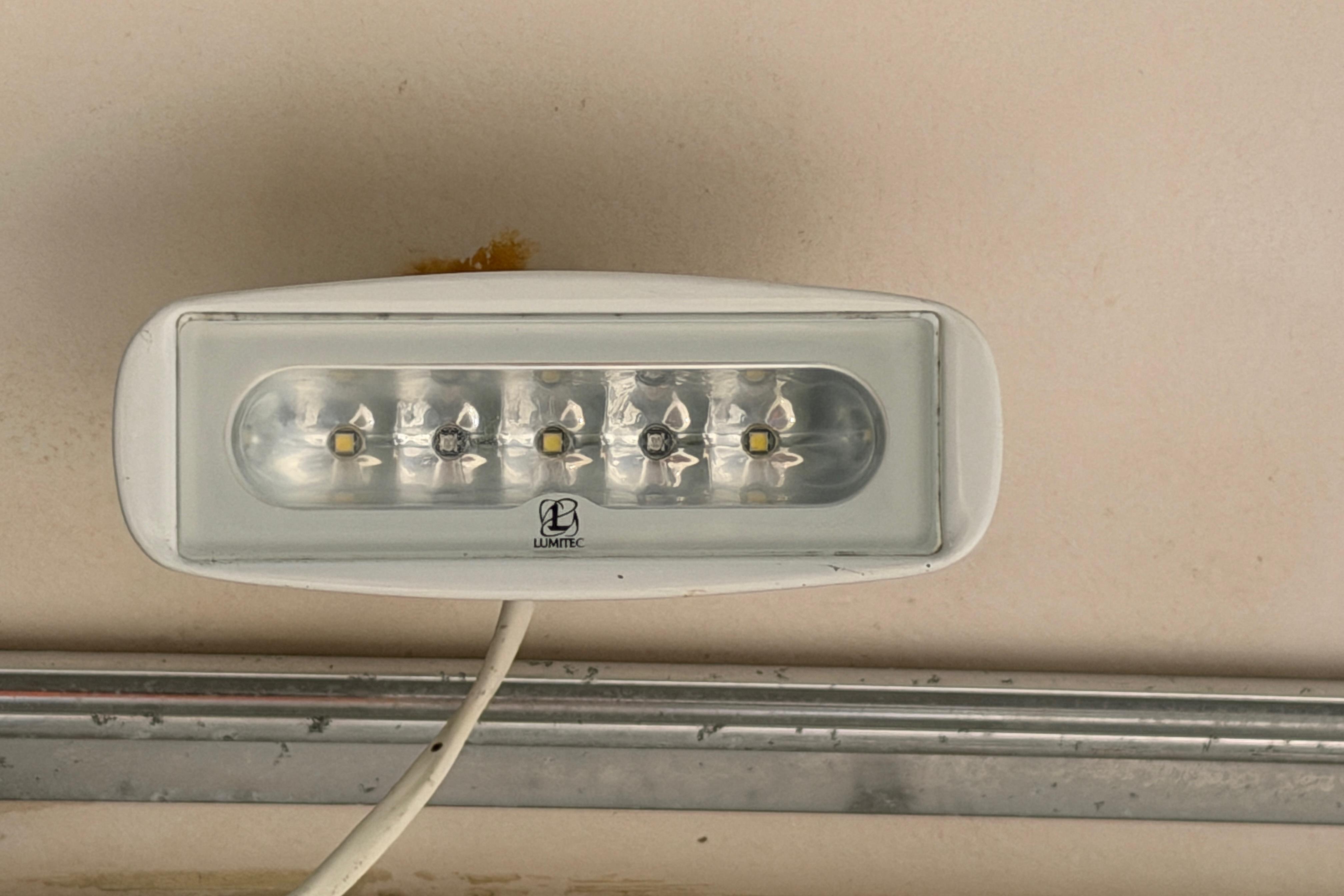 Lumitec LED light fixture on 2006 Grady-White Sailfish 282 boat ceiling.