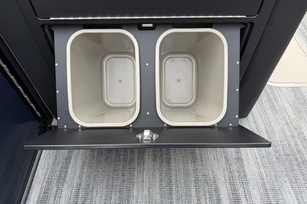 Dual storage compartments in 2026 Godfrey Monaco 235 SFLC iMPACT boat.