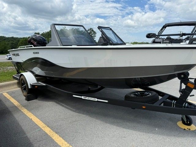 2024 Vexus ADX180 boat parked on trailer outdoors.