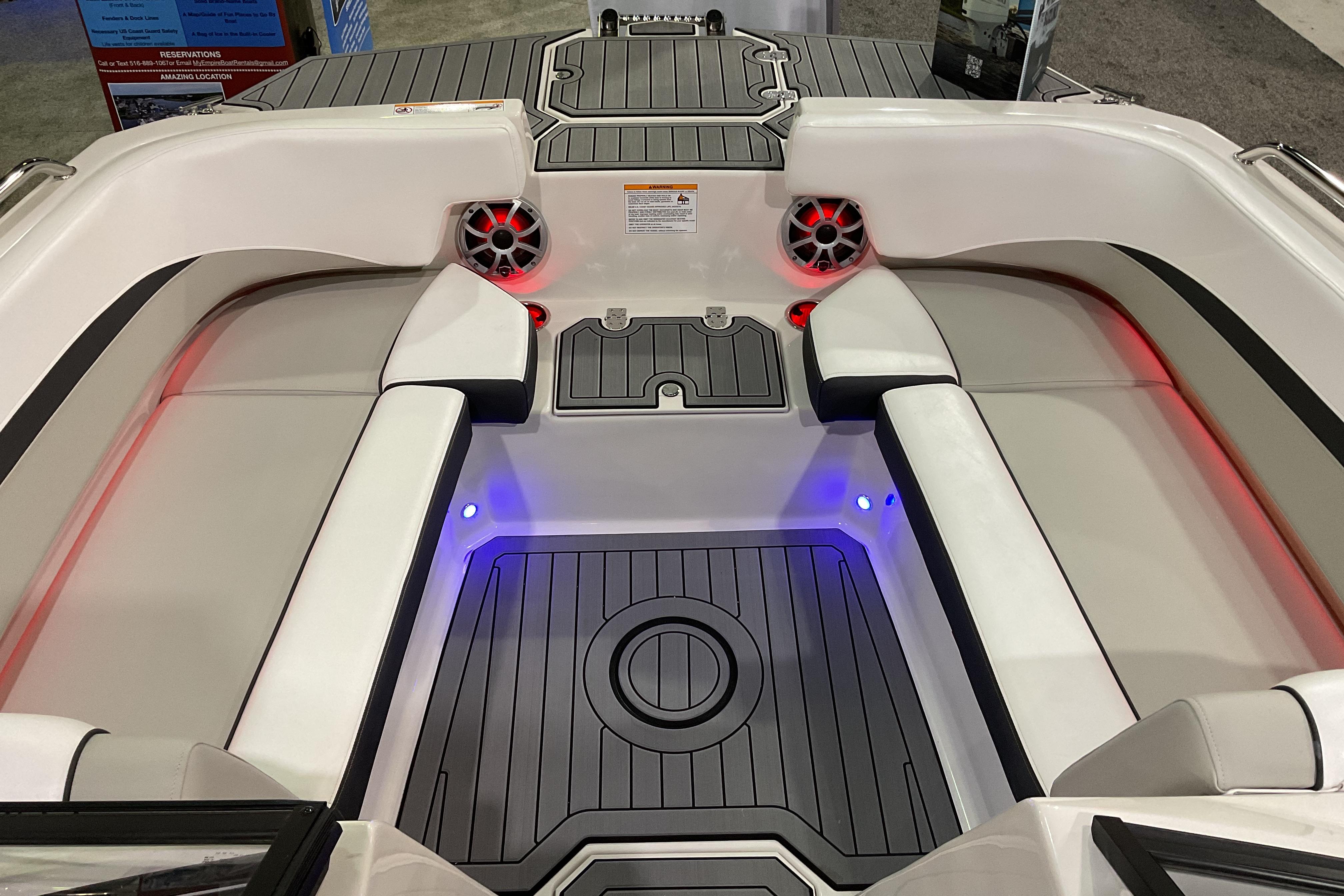 Interior of 2026 Starcraft SVX 210 DC OB boat with stylish seating and LED lighting.