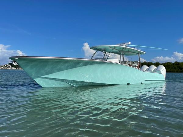 2025 Mag Bay 43 Center Console boat on clear water.